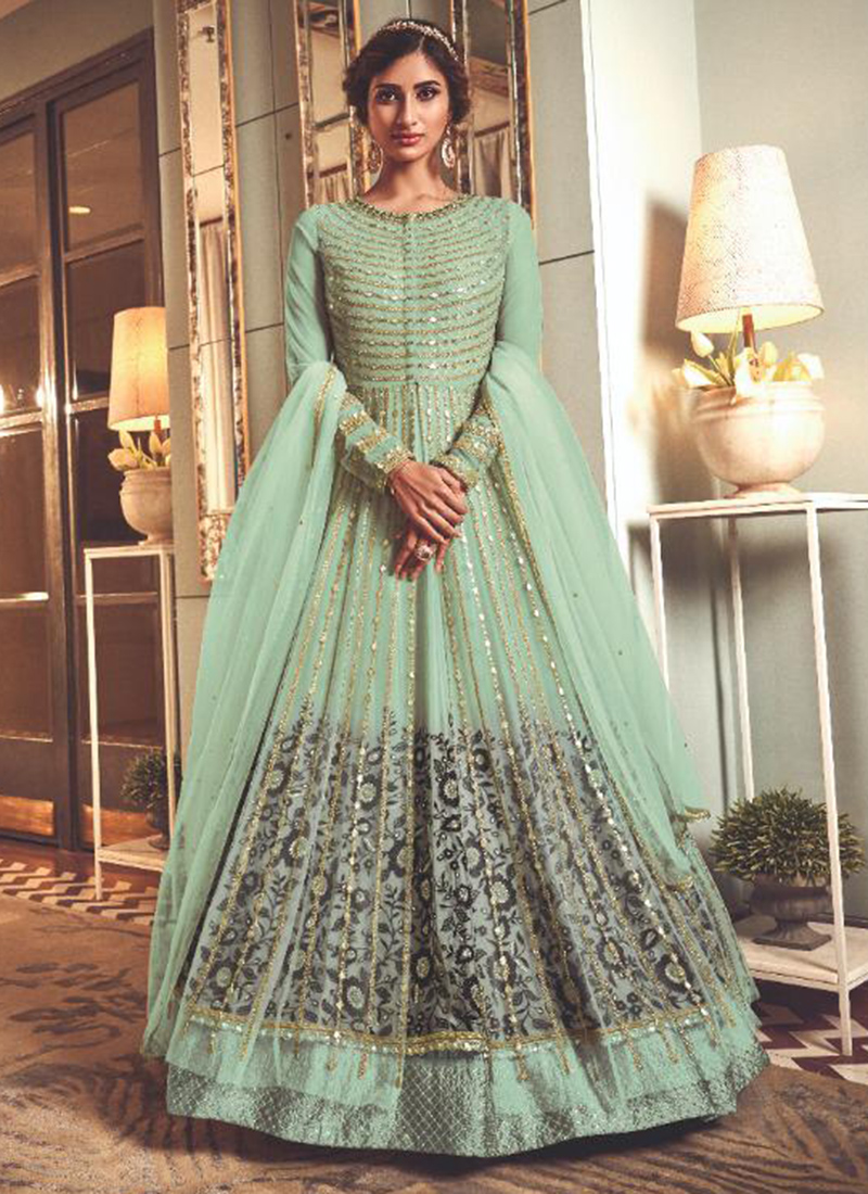 Pista Green Embroidered Tiered Gown Design by Ekru by Ekta and Ruchira at  Pernia's Pop Up Shop 2023