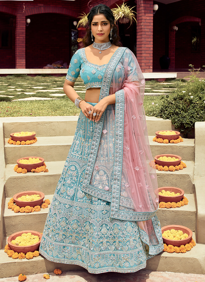 Pristine Net Turquoise Embroidered Trendy Lehenga Choli -