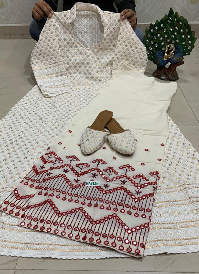 Buy Maroon Pure Cambric Cotton Traditional Wear Sequins Work Kurti With