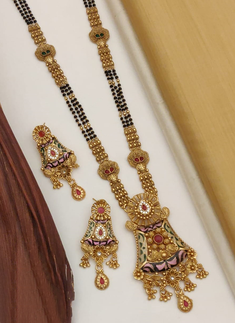 Buy Gold Forming Black Beads Long Mangalsutra Designs for Women