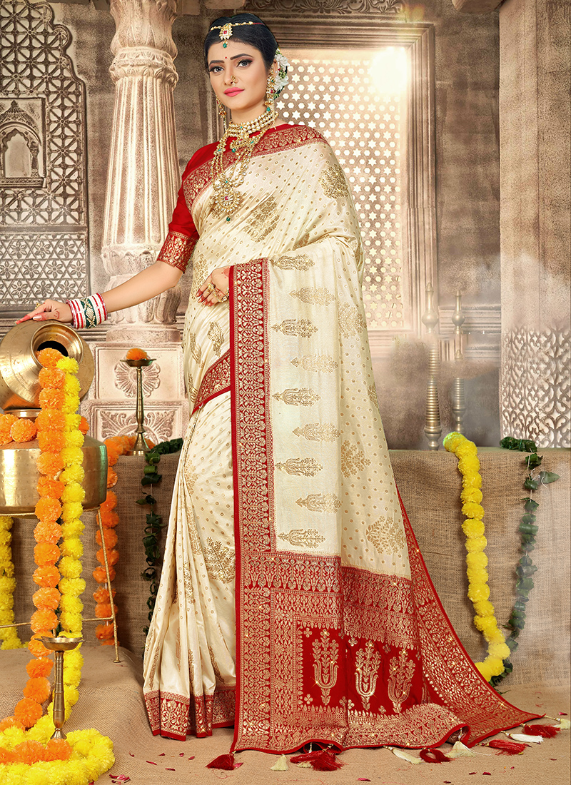 Best embroidered cream color dola silk saree with a maroon blouse