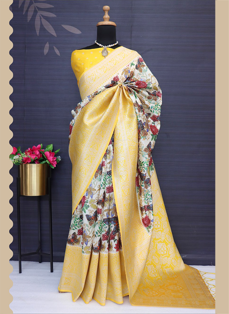 Cream and Navy Blue color silk sarees with all over floral design along  with contrast jacquard