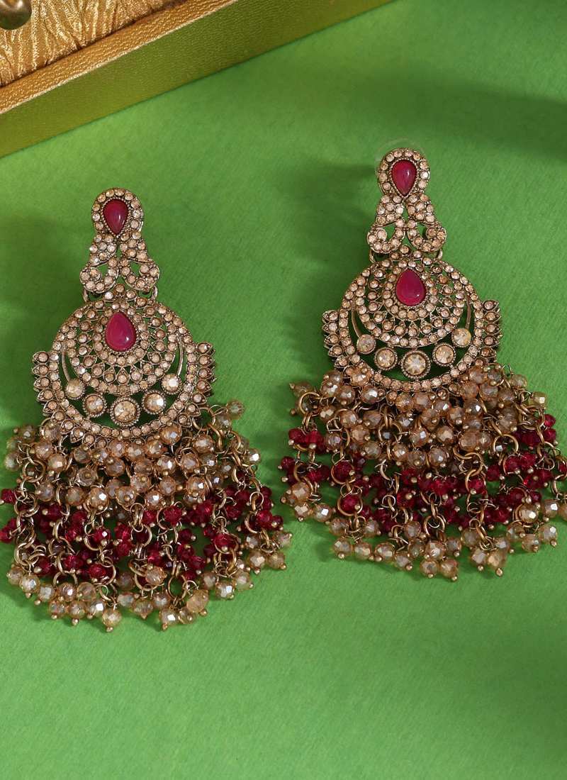 Buy Party Wear Rani Color Gold Tone Crsytal Earrings Online From