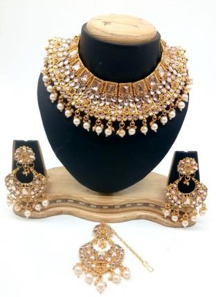 Golden Kundan And Stone Multi Piece Necklace Set