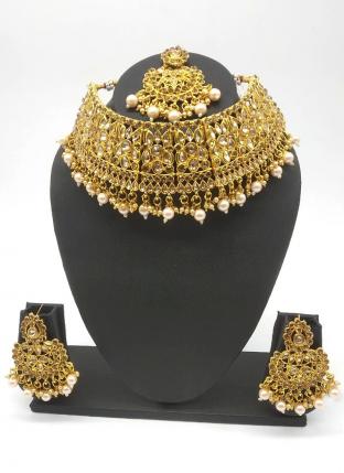 Golden Beautiful Stone And Kundan Studded Bridal Necklace Set