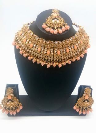 Peach Beautiful Stone And Kundan Studded Bridal Necklace Set