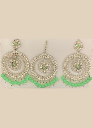 Light Green Silver Tone Stone Studded Earrings With Maang Tikka