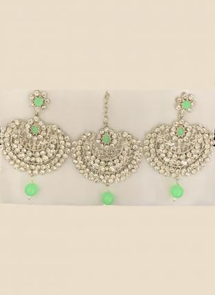 Light Green Chandbali Design Stone Studded Earrings With Maang Tikka