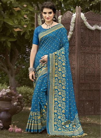 2022y/December/37002/Sky-Blue-Georgette-Party-Wear-Embroidered-Saree-CHAMPION-1407.jpg